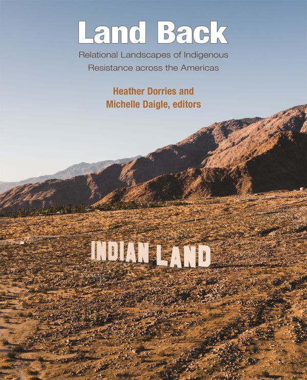 book cover. title Land Back. mountains in background